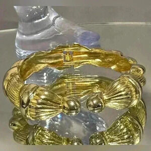 $6 Add-On | Women’s Gold tone  metal hinged bangle bracelet